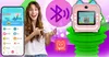A woman is pointing at a smartphone app and a pink instant camera with a QR code on its screen. The background is a colorful, abstract design with a large purple Bluetooth symbol. Anteprima dell’immagine prodotto