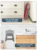 A collage showing a foldable stool stored in a corner and hung on a wall. Produktbild-Vorschau