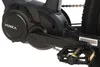 A close-up view of the electric motor and pedal assembly of an e-mountain bike. Produktbild-Vorschau