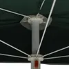 Close-up view of the underside of a green umbrella, showing the central pole and spokes. Náhľad obrázku produktu