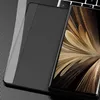 A smartphone case is shown on a textured surface, next to a laptop keyboard. Anteprima dell’immagine prodotto