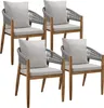 Four outdoor chairs arranged in a group. Voir les images du produit
