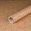 Papier cadeau pour Noël, étoiles, rouge, 0,70 x 10 m - Voir les images du produit 1