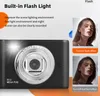 A digital camera with its flash on, shown next to marketing images demonstrating the flash effect. Náhled obrázku produktu