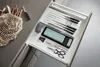 A kitchen drawer with knives, scissors, and a sharpening stone. Anteprima dell’immagine prodotto