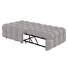 A light gray upholstered ottoman with a metal frame underneath, shown from a side angle against a white background. Náhľad obrázku produktu