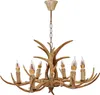 A chandelier made of faux antlers with six candle-shaped lights. Podgląd zdjęcia produktu