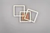 A modern ceiling light fixture with three overlapping square frames and a central square element. Anteprima dell’immagine prodotto