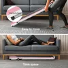 A split image showing a pink and white treadmill. The top half shows a person moving the treadmill, highlighting its wheels and ease of movement. The bottom half shows the treadmill stored under a couch, emphasizing its space-saving design. Produktbild-Vorschau