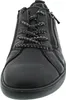 A close-up, front-facing view of a black sneaker. Produktbild-Vorschau