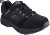 A black Skechers shoe is shown from a side-angle on a white background. Anteprima dell’immagine prodotto