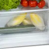 Vegetables inside a refrigerator drawer. Voir les images du produit