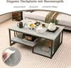 A modern coffee table with a marble-like finish is shown in a living room setting, with decorative items on top and storage below. A close-up inset shows a hand wiping the surface with a wet cloth. Produktbild-Vorschau