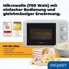 A marketing image for a microwave oven, featuring the product, awards, and descriptive text. Produktbild-Vorschau
