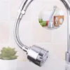 A close-up of a flexible faucet extender with water spraying from it. Náhľad obrázku produktu