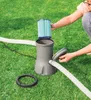 A person is shown installing a filter into a pool pump system on a grassy lawn. Produktbild-Vorschau