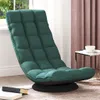 A dark green swivel floor chair is shown in a room with a window and pink curtains. Produktbild-Vorschau