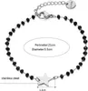 Bracelet en acier chirurgical avec perles noires Star Voir les images du produit 2