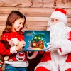A young girl and Santa Claus are holding an advent calendar with a Christmas house illustration. Náhľad obrázku produktu