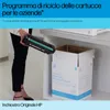 A person is holding a used toner cartridge over a recycling bin. Náhľad obrázku produktu