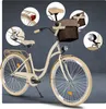 A collage of a cream-colored women's bicycle with brown accents, showing various details. Produktbild-Vorschau