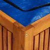 A close-up view of the corner of a wooden garden storage box with a blue tarp cover. Podgląd zdjęcia produktu