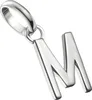 A silver letter M charm pendant. Anteprima dell’immagine prodotto