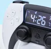Close-up of a white and black PlayStation PS5 controller with a digital clock display. Náhled obrázku produktu