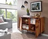 A living room scene with a wooden sideboard, sofa, and large window. Náhled obrázku produktu