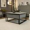 Modern living room with a coffee table and artwork. Produktbild-Vorschau