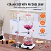 A laboratory distillation setup with glass beakers, flasks, and heating elements, set on a wooden table with some decorative flowers and small bottles in the background. Produktbild-Vorschau