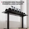 A black standing desk with weights on top, set against a window with blinds. Voir les images du produit