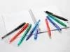 Several pens are arranged on an open notebook with handwritten text. Produktbild-Vorschau