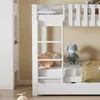 A close-up view of a white bunk bed with stuffed animals and bedding. Podgląd zdjęcia produktu