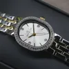 A close-up shot of a women's watch on a black surface. Náhled obrázku produktu