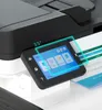 Close-up of a printer's touchscreen interface with a digital overlay highlighting the screen size. Produktbild-Vorschau