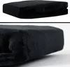 A black plush blanket folded. Produktbild-Vorschau