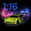 A neon yellow and black remote control car with purple accents, displayed against a dark background with smoky, colorful lighting effects. Voir les images du produit
