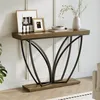 A console table with decorative items on top, placed against a wall. Podgląd zdjęcia produktu