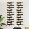Two black metal wine racks mounted on a white wall, each holding multiple wine bottles. Produktbild-Vorschau