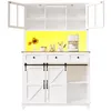 A white kitchen hutch with glass doors on top, a wood-colored countertop, and barn-style doors on the bottom. The background behind the countertop is bright yellow. Anteprima dell’immagine prodotto