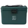 A dark green cooler box with a black strap and latch, featuring a white logo and text on the front. Produktbild-Vorschau