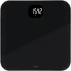 A black Fitbit Aria Air smart scale is shown from a top-down perspective on a white background. The scale displays a weight of 154.2 lbs. Produktbild-Vorschau