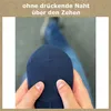 Hands holding a navy blue sock, demonstrating a feature. Produktbild-Vorschau