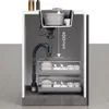 Cutaway view of a kitchen sink cabinet showing the plumbing and storage drawers below. Produktbild-Vorschau