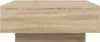 A close-up, side view of a wooden coffee table. Náhľad obrázku produktu