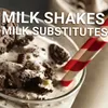 A close-up of a milkshake with cookies and a striped straw, with text overlay. Podgląd zdjęcia produktu
