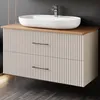 A modern bathroom vanity with a vessel sink and faucet. Produktbild-Vorschau