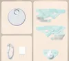 A collage of product images showing the Owlet Dream Sock and its accessories. Produktbild-Vorschau