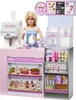 A Barbie doll is standing behind a pink cafe counter, serving customers. Produktbild-Vorschau